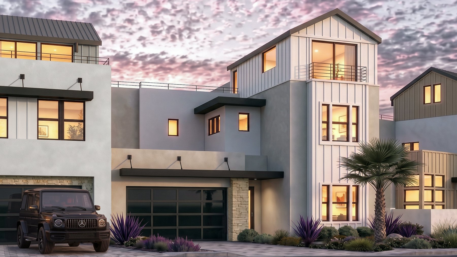 Residence 1 at Rocky Ridge at dusk. Color scheme 1, with white vertical siding rising three levels to a roof deck, a rail at the top floor and a glass-paneled two-car garage.