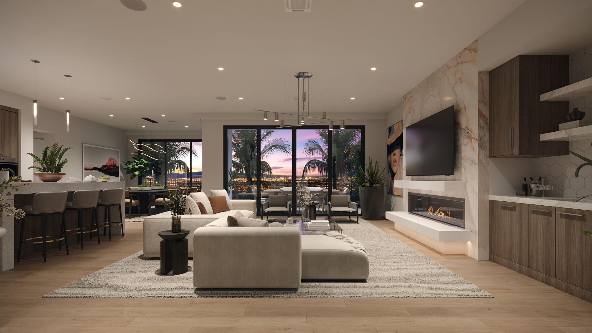 A Rocky Ridge great room at dusk, with sliding glass doors open to a terrace and the city lights of the valley beyond, a linear fireplace and an open kitchen.